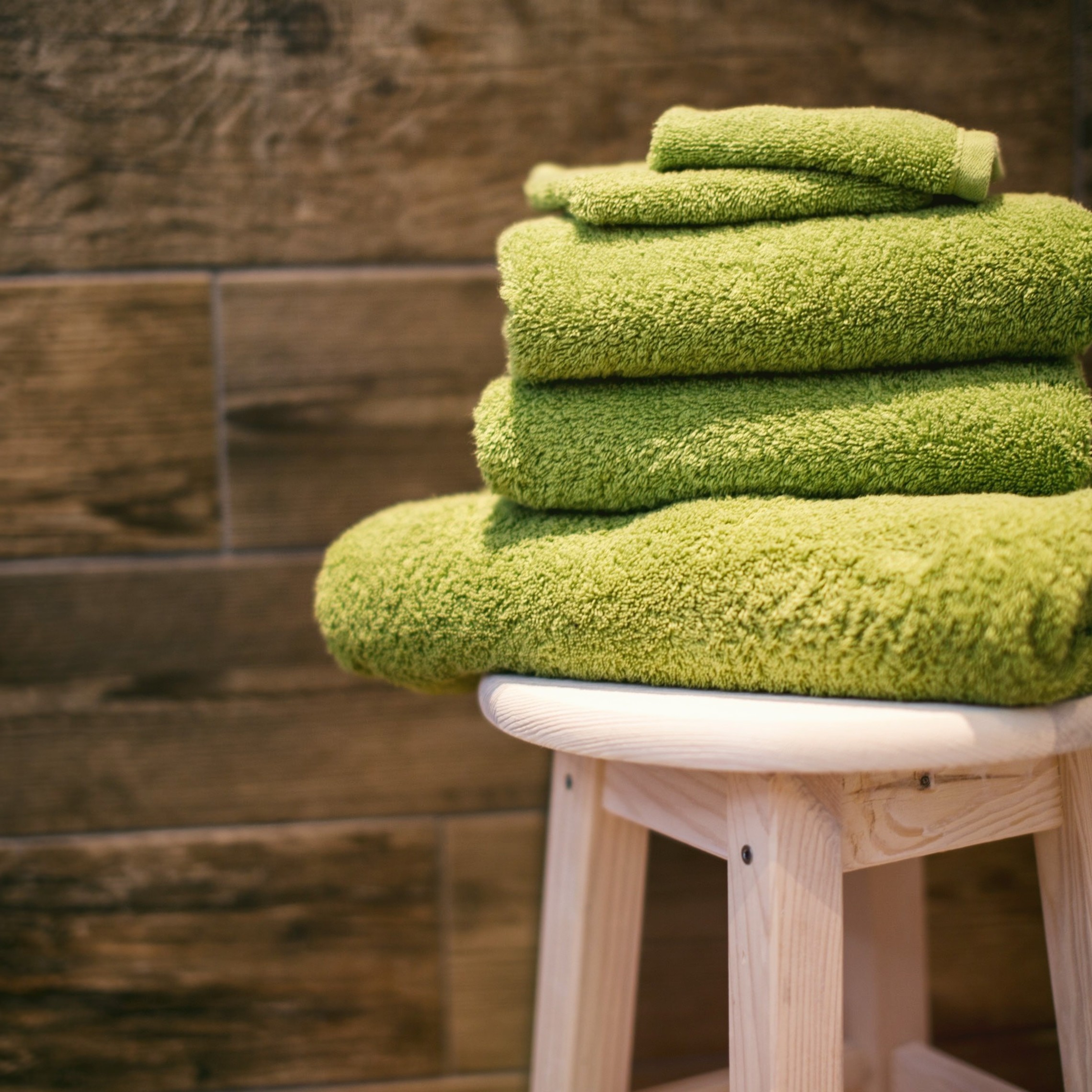 Towels on a stool in a sauna