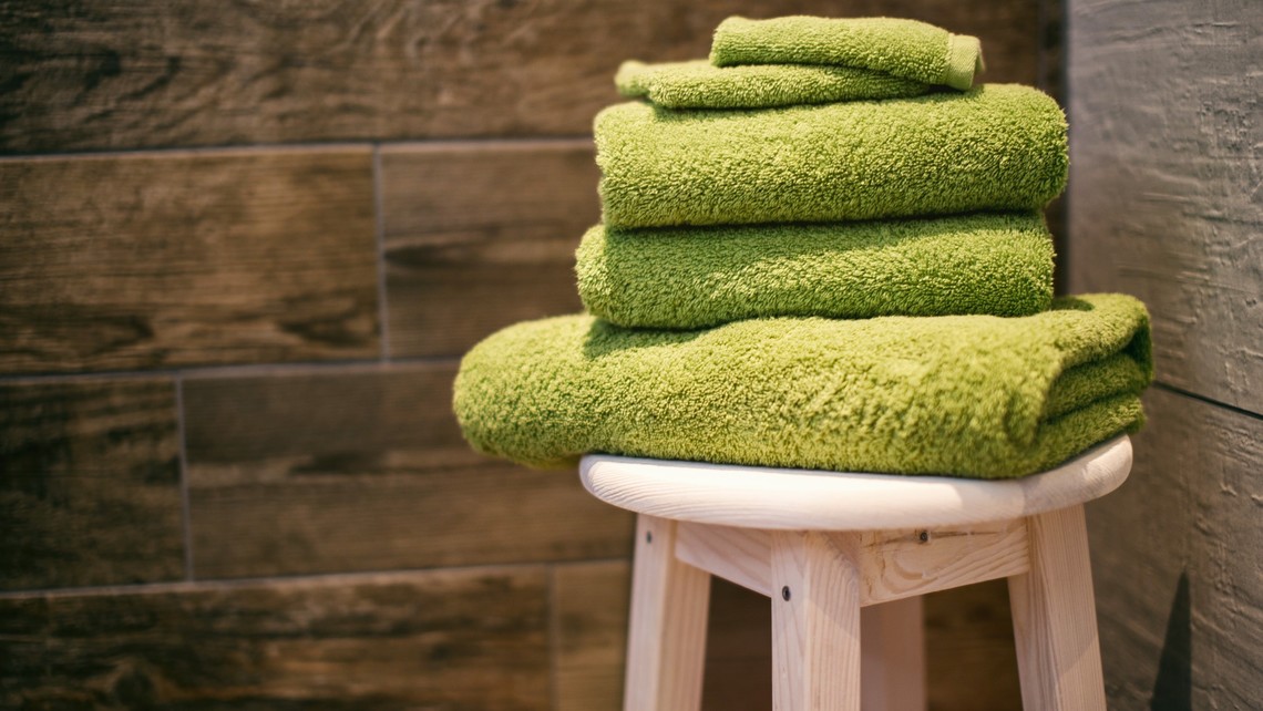 Towels on a stool in a sauna