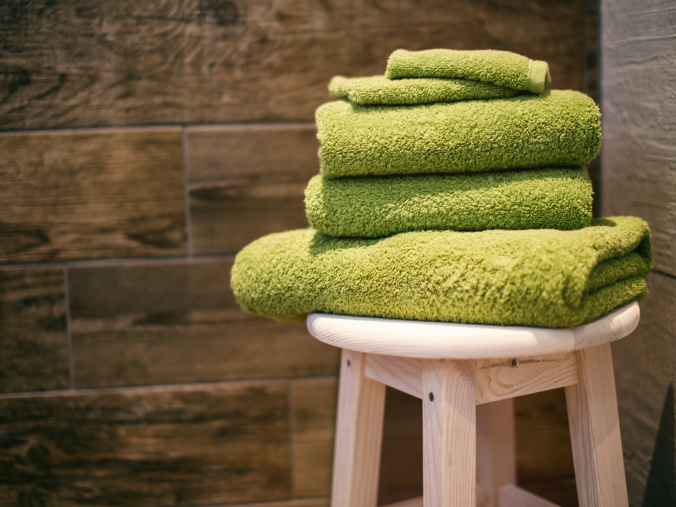 Towels on a stool in a sauna
